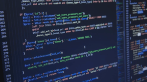 Decorative blog header banner featuring blurred code.